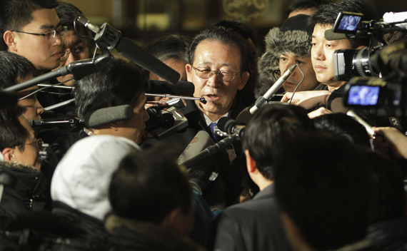 North Korea’s envoy to the six-party talks Kim Kye-gwan (C) speaks to the media after a meeting with a Chinese foreign ministry counterpart in Beijing, February 11, 2010. 