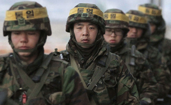 South Korean marines patrol on Yeonpyeong Island December 21, 2010. 