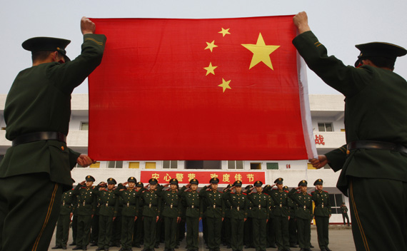 Add to cart Add to lightbox (The Chronicle - February Cover Options) Download layout (Watermarked) Paramilitary police recruits take an oath in front of a Chinese national flag during a military rank conferral ceremony at a military base in Suining