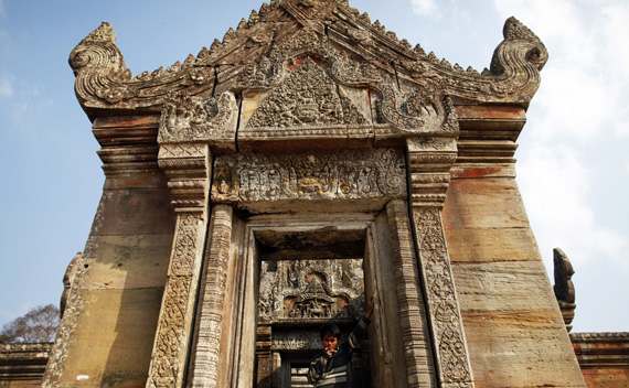 A Cambodian soldier smokes a cigarette at the 11th-century Preah Vihear temple on the border between Thailand and Cambodia