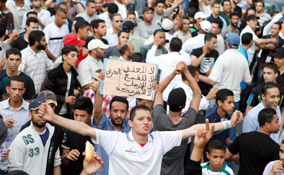 Protesters shout anti-government slogans during a pro-democracy demonstration organised by the 