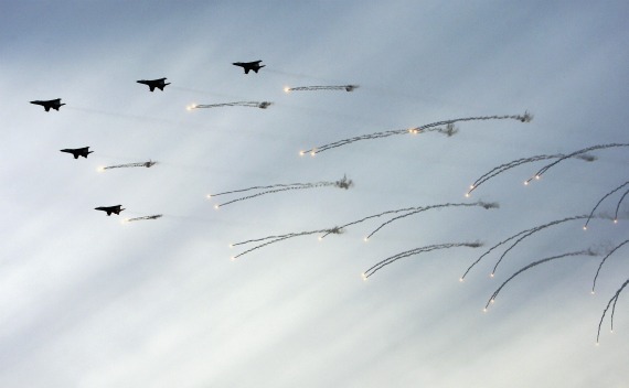 Chinese fighter jets take part in an international fleet review to celebrate the 60th anniversary of the founding of the People’s Liberation Army Navy in Qingdao, Shandong province on April 23, 2009.