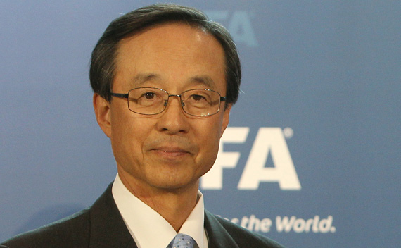 Chairman of South Korea’s bid committee Sung-Joo Han submits the official bid book for the 2022 Soccer World Cup to FIFA President Blatter in Zurich
