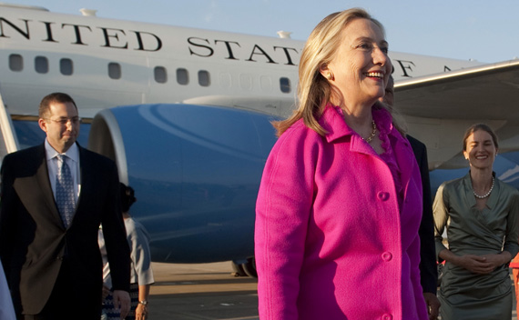 U.S. Secretary of State Clinton smiles upon her arrival in Naypyitaw, Myanmar