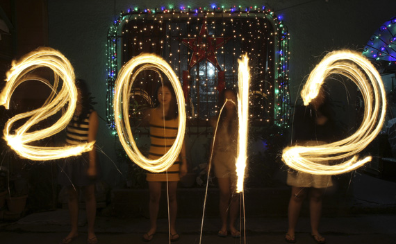 Women use sparklers to draw