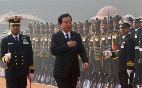 Japan’s Prime Minister Yoshihiko Noda inspects a guard of honour during his ceremonial reception at the presidential palace in New Delhi