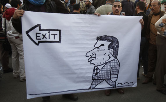 Protesters hold a banner during a demonstration in Cairo