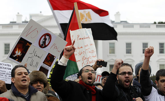 Demonstrators shout slogans during protest outside the White House 