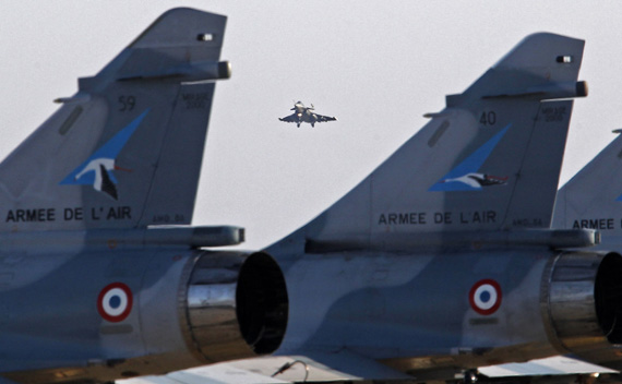 A French fighter jet prepares to land at the military air base on the island of Corsica where France runs its military operation against Libya. (Jean-Paul Pelissier/courtsey Reuters)