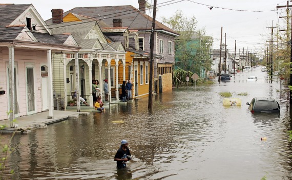 A man walks through the flooded Terme area of New Orleans, lying under several feet of water on August 29, 2005.