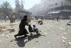 Syria-woman-displaced-airstrike-Douma-Assad