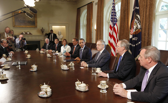 President Obama hosts a meeting with congressional leaders to discuss ongoing efforts to find a balanced approach to deficit reduction in the Cabinet Room of the White House in Washington July 7, 2011. (Larry Downing/ courtesy Reuters) 