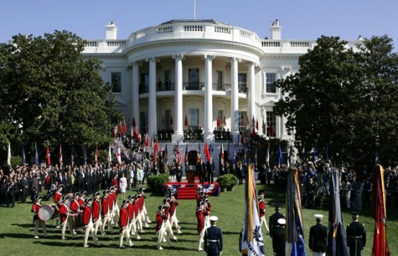 U.S. President George W. Bush and Chinese President Hu Jintao watch members of the Old Guard march during a welcoming ceremony on the South Lawn of the White House April 20, 2006.