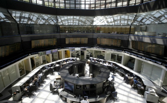 Mexico’s stock exchange employees work at their desks in Mexico City (Henry Romero/Courtesy Reuters).