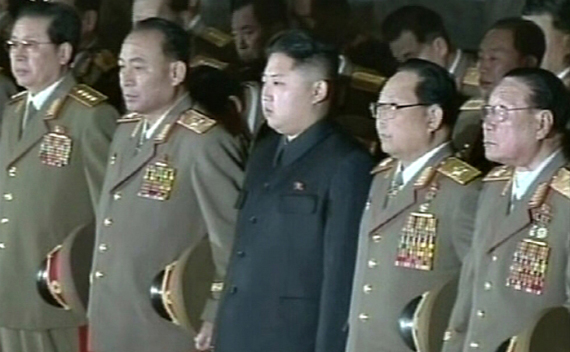 North Korean Leader Kim Jong-un and military officer Jang Song-taek paying their respects (Courtesy: Reuters)
