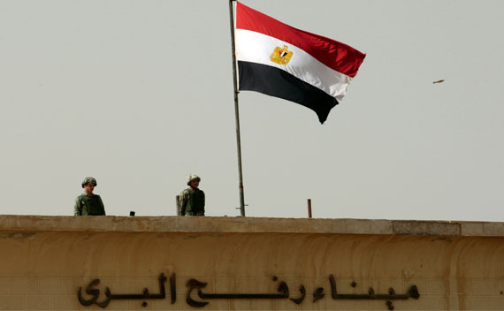 Egyptian security forces stand guard at the Rafah border crossing in the southern Gaza Strip (Ismail Zaydah, Courtesy Reuters)