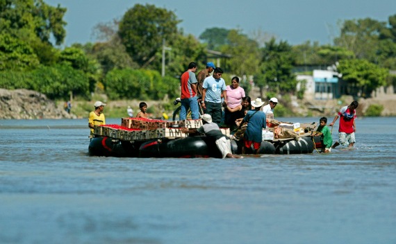 Undocumented Migrants travel on raft bound for Ciudad Hidalgo, Mexico 