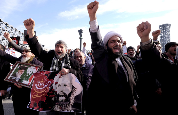 Iranian protesters chant slogans during a demonstration against the execution of Shi’ite cleric Sheikh Nimr al-Nimr in Saudi Arabia, at Imam Hussein square in Tehran January 4, 2016. 