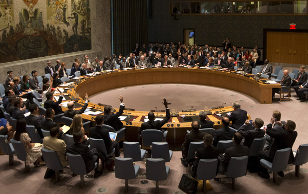 The United Nations Security Council votes to approve a resolution on Iran’s nuclear program at the UN headquarters in New York July 20, 2015