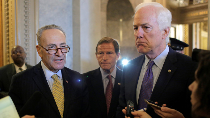 Senators Chuck Schumer, Richard Blumenthal, and John Cornyn speak after the Senate voted to override U.S. President Barack Obama’s veto of a bill that would allow lawsuits against Saudi Arabia’s government over the September 11, 2001, attacks.