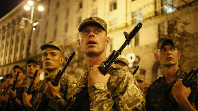 Ukrainian soldiers take part in a rehearsal for the Independence Day military parade, in the center of Kiev. 