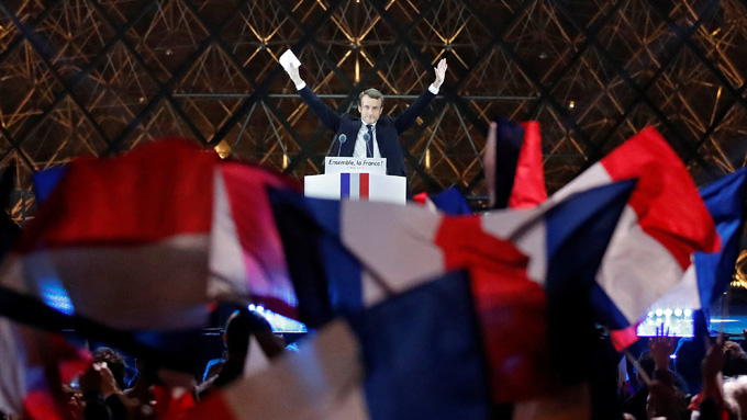 Macron celebrates his victory among supporters