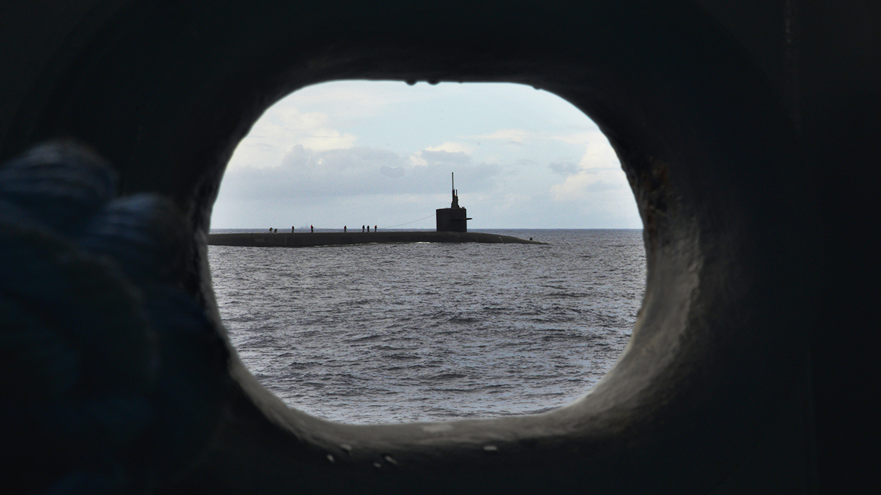 The Ohio-class ballistic-missile submarine USS Tennessee (SSBN 734) transits on the surface during a routine strategic deterrent patrol in the Atlantic Ocean.