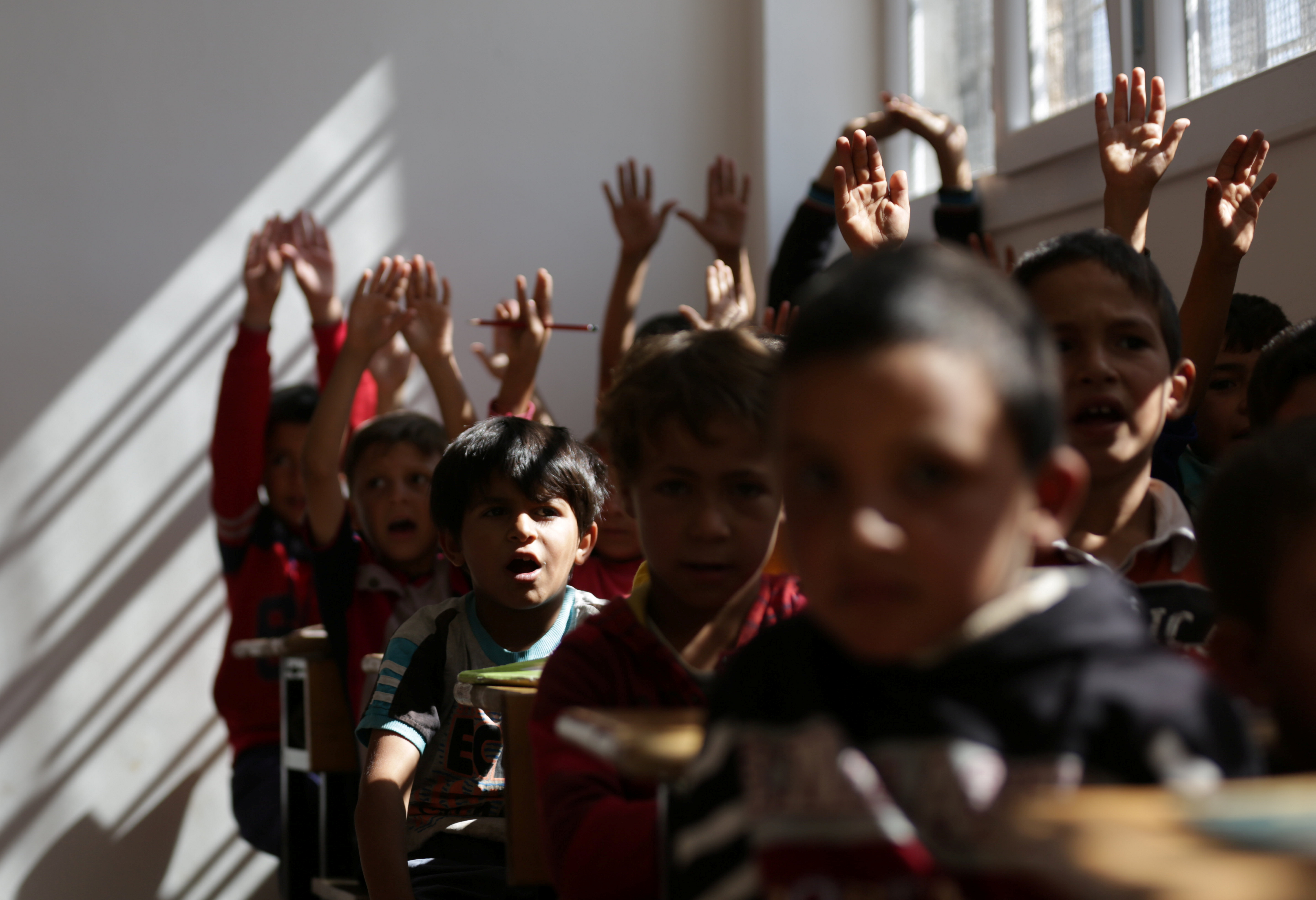 Students attend school in the northern city of al-Bab.