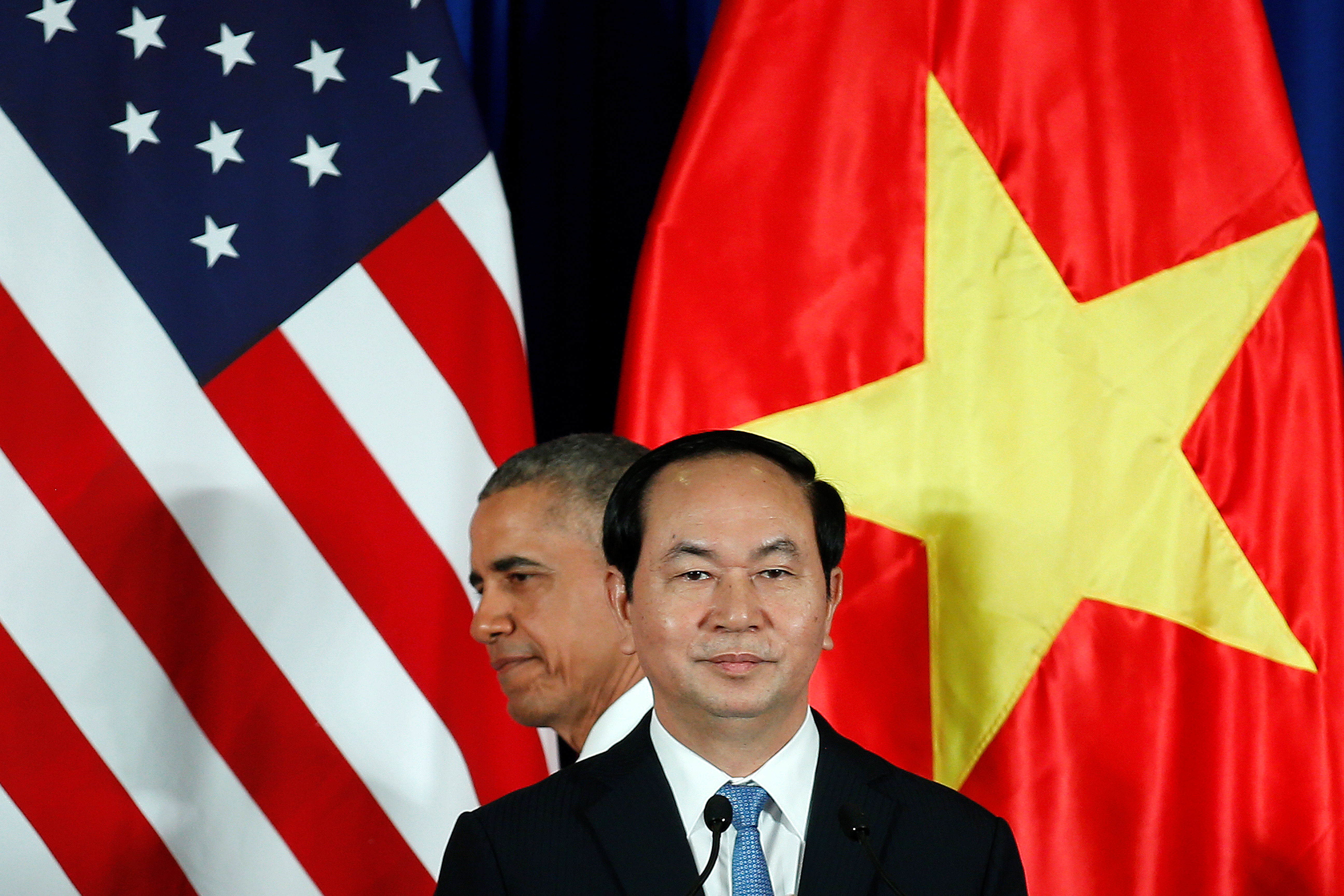 U.S. President Barack Obama addresses the press with Vietnamese President Tran Dai Quang in Hanoi, May, 2016.