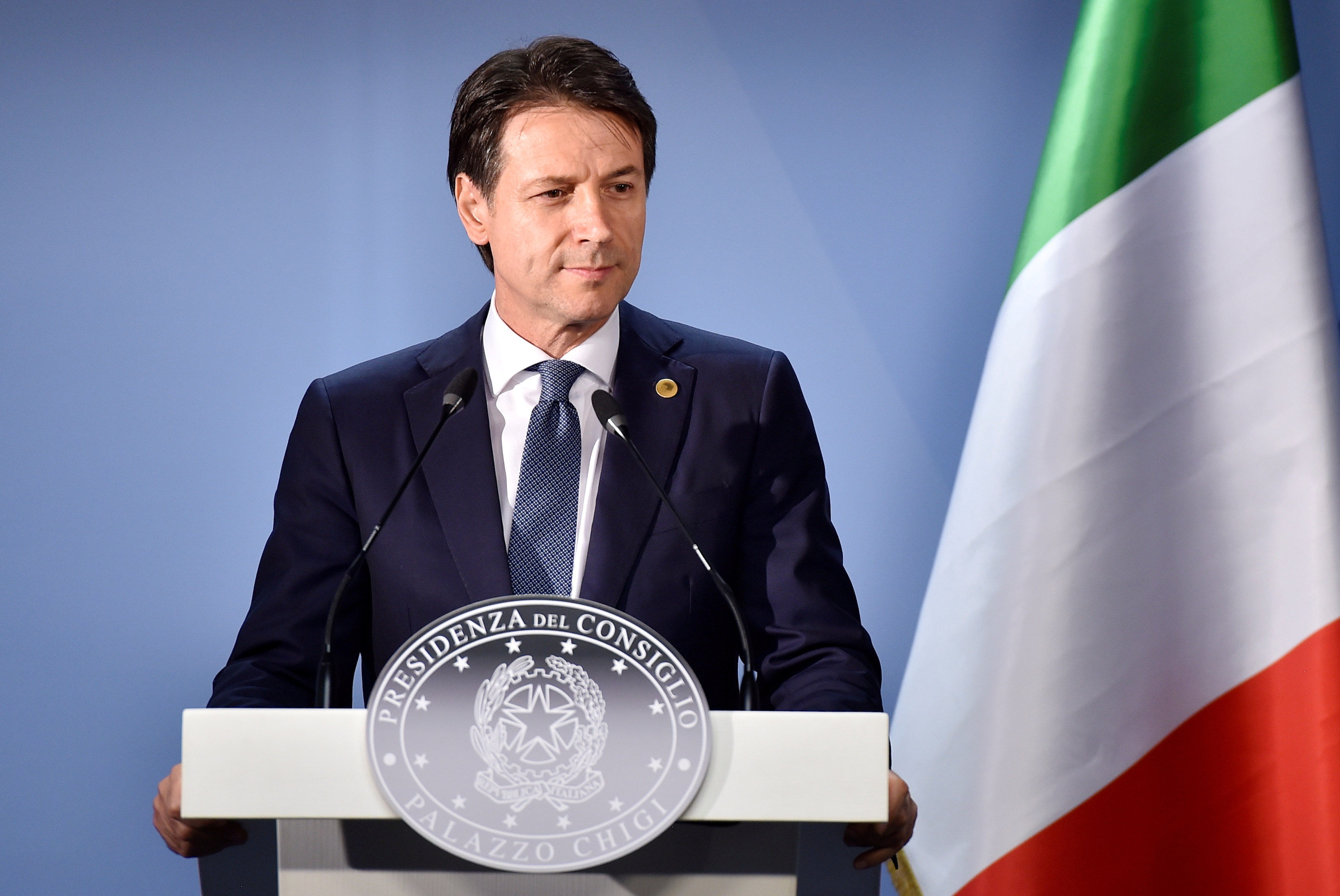 Italian Prime Minister Giuseppe Conte speaks at a news conference.