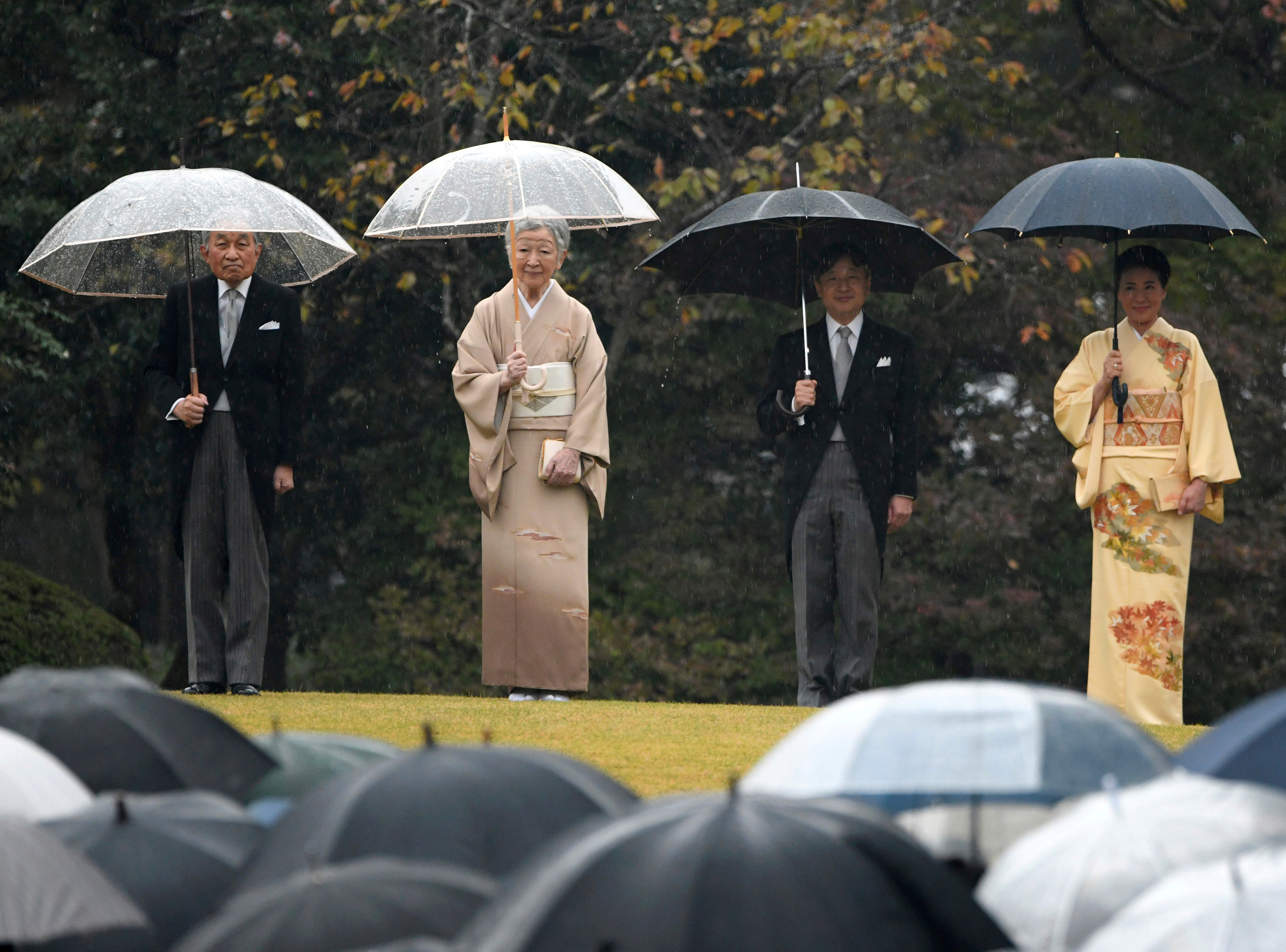 Emperor Akihito, Empress Michiko, Crown Prince Naruhito, and Crown Princess Masako attend a party in Tokyo.