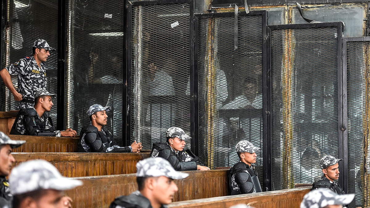 Members of the Muslim Brotherhood are tried in Cairo on charges related to demonstrations against President Mohammed Morsi’s ouster.