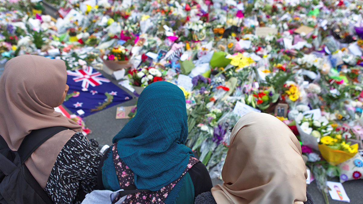 Women pay tribute to the victims of the mosque attack.