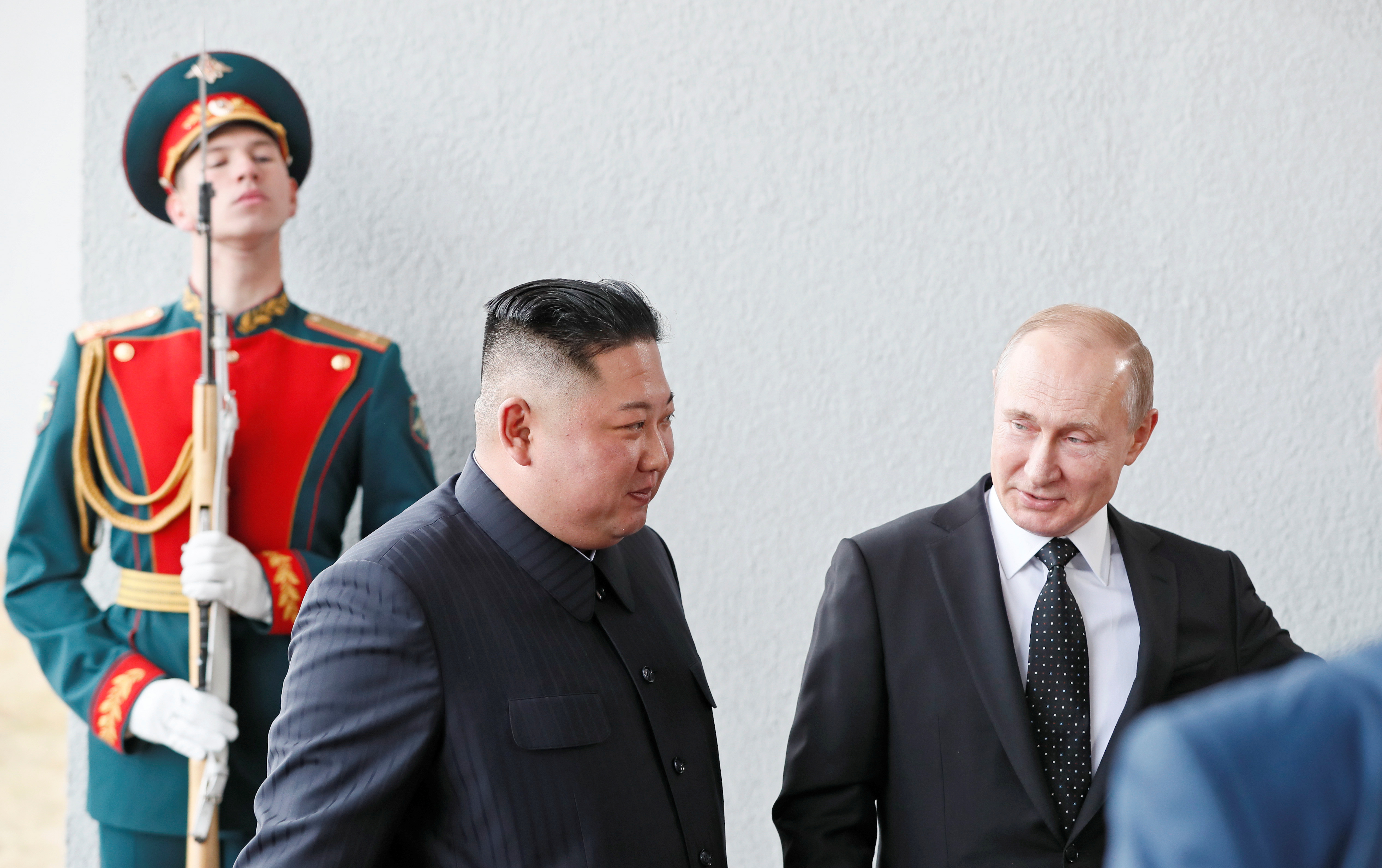 Russian President Vladimir Putin walks with North Korean leader Kim Jong-un in Vladivostok, Russia. 