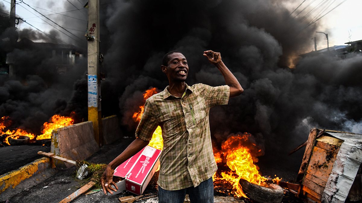A man takes part in a protest in Port-au-Prince, Haiti.