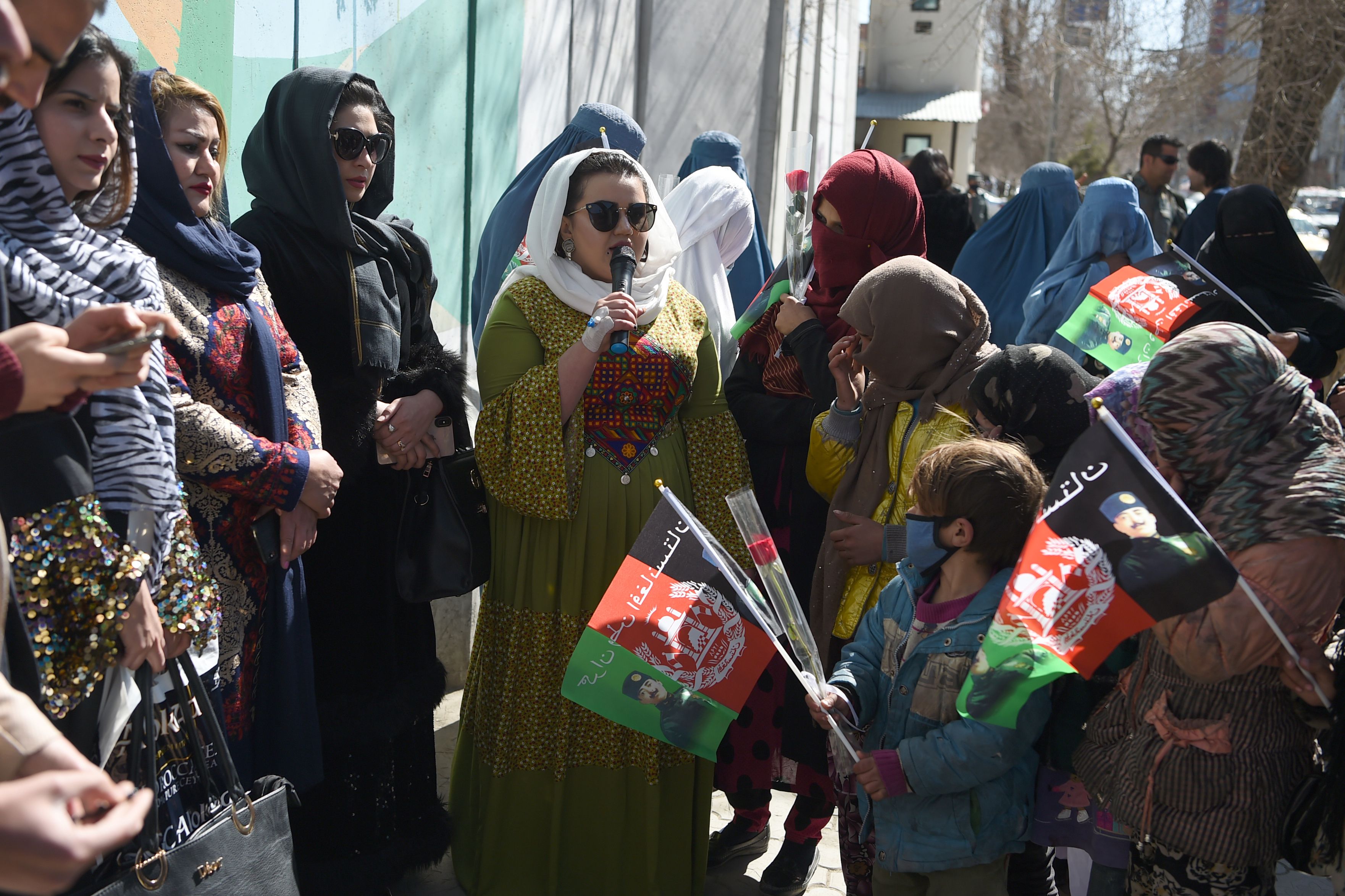 Afghan civil activists gathering along a road during International Women’s Day in Kabul, Afghanistan, on March 8, 2020.