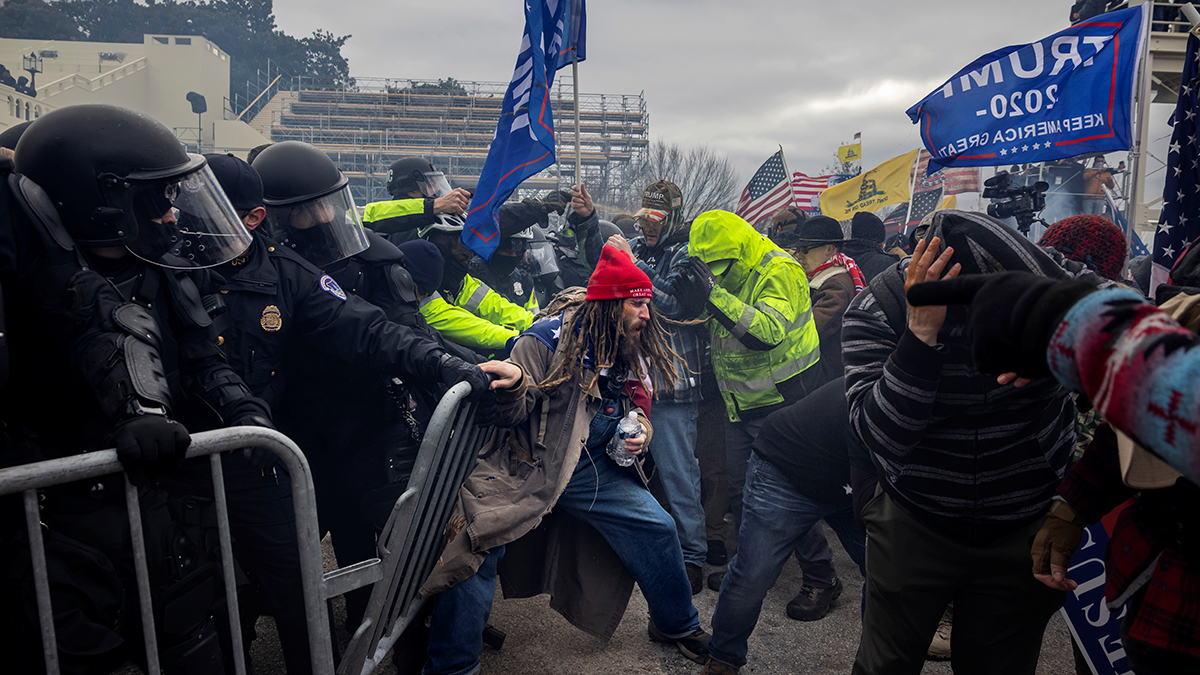 Supporters of former President Donald J. Trump clash with police as people try to storm the U.S. Capitol on January 6, 2021.