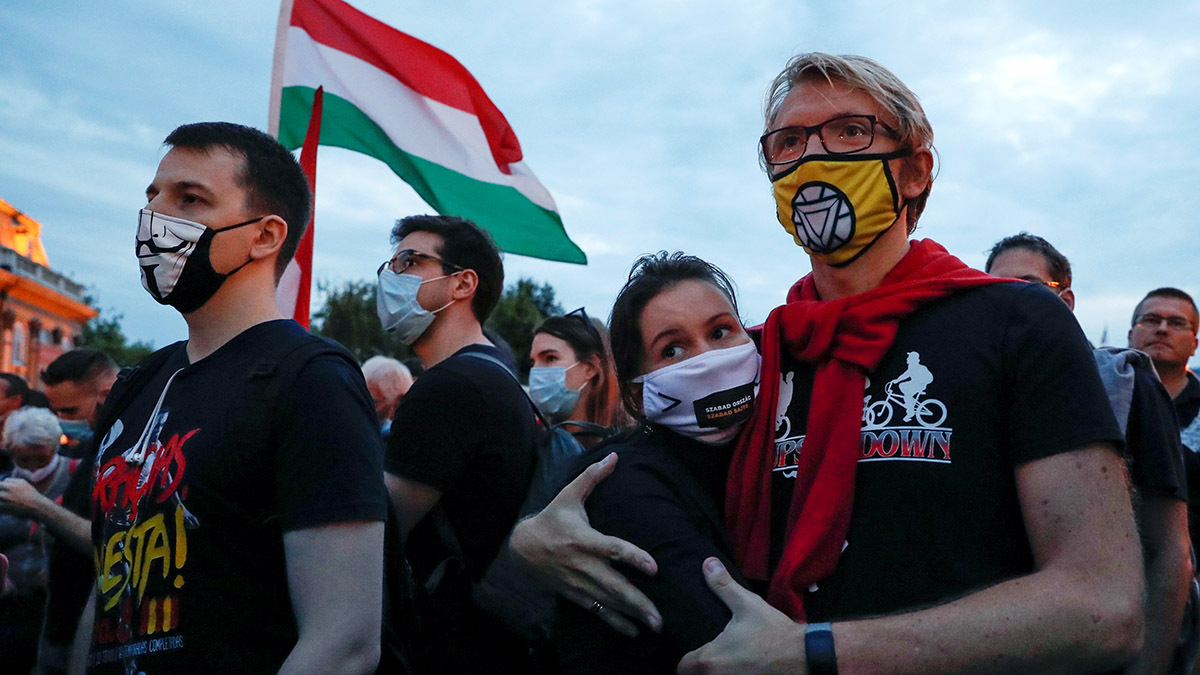 Protestors march in Hungary in a demonstration against attacks on press freedom.