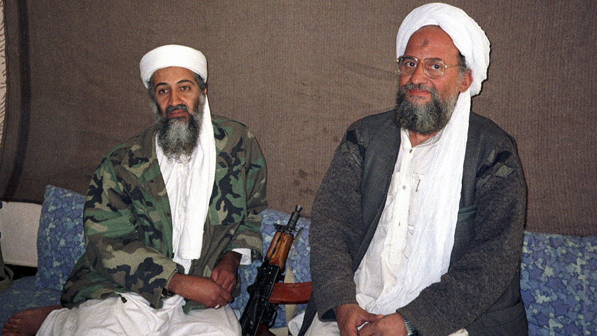 Al-Qaeda leaders Osama bin Laden and Ayman al-Zawahiri are seen seated next to each other