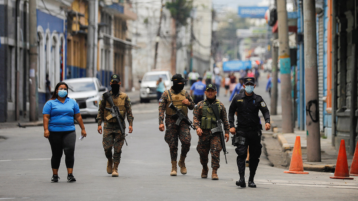 Members of El Salvador’s security forces patrol the capital of San Salvador.