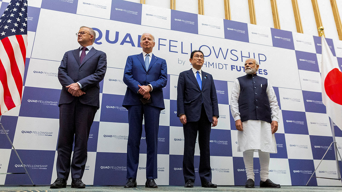 Australian Prime Minister Anthony Albanese, U.S. President Joe Biden, Japanese Prime Minister Fumio Kishida, and Indian Prime Minister Narendra Modi stand next to each other.