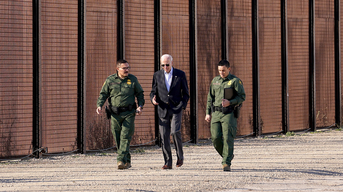 President Joe Biden speaks with officials at the U.S.-Mexico border in El Paso, Texas.