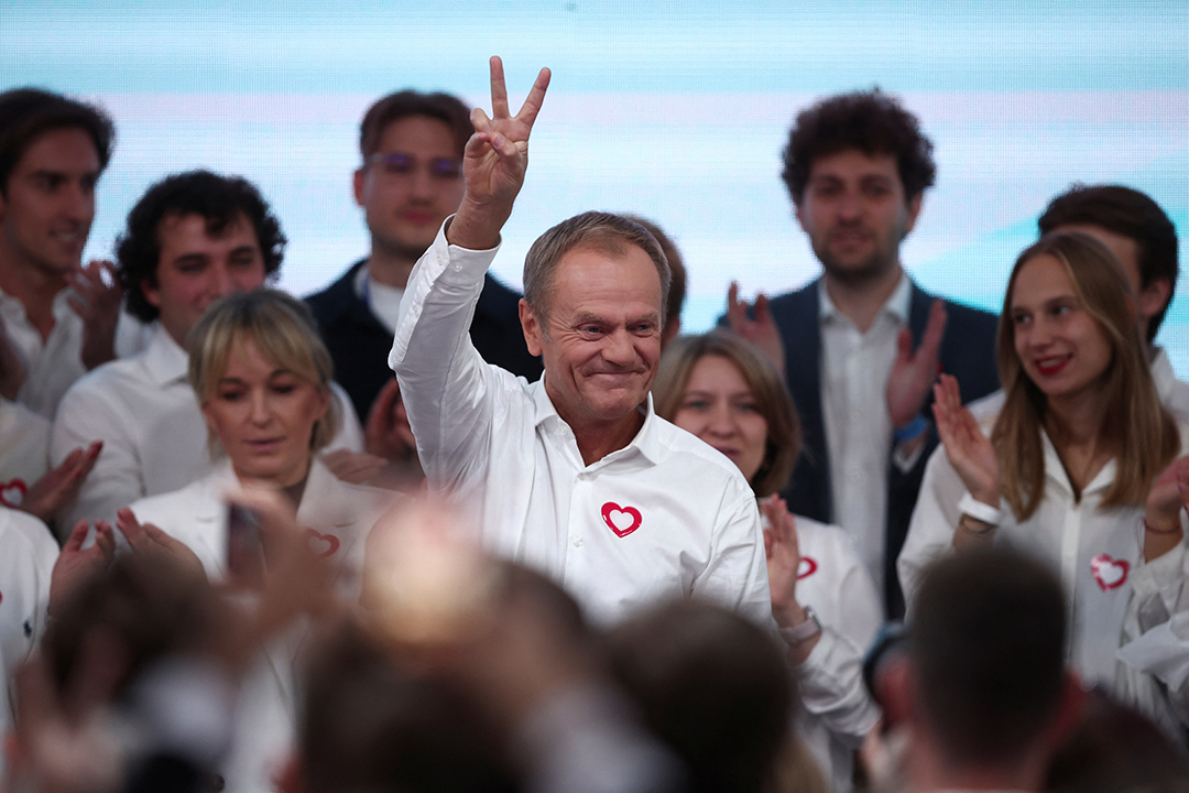 Opposition leader Donald Tusk celebrates the exit poll results in Warsaw on October 15, 2023.