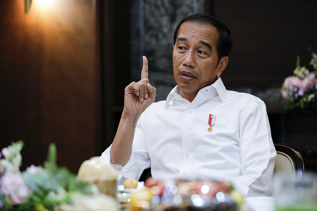 President Jokowi gestures during meeting in Presidential Palace.