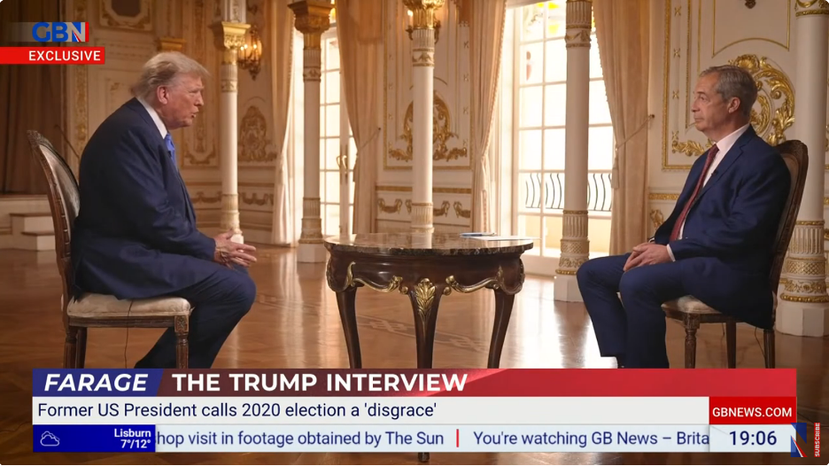 Trump as viewed sitting across from Nigel Farage.