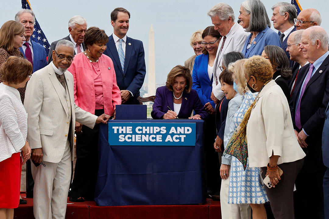 Then U.S. House Speaker Nancy Pelosi signs the CHIPS and Science Act on Capitol Hill, in July 2022.