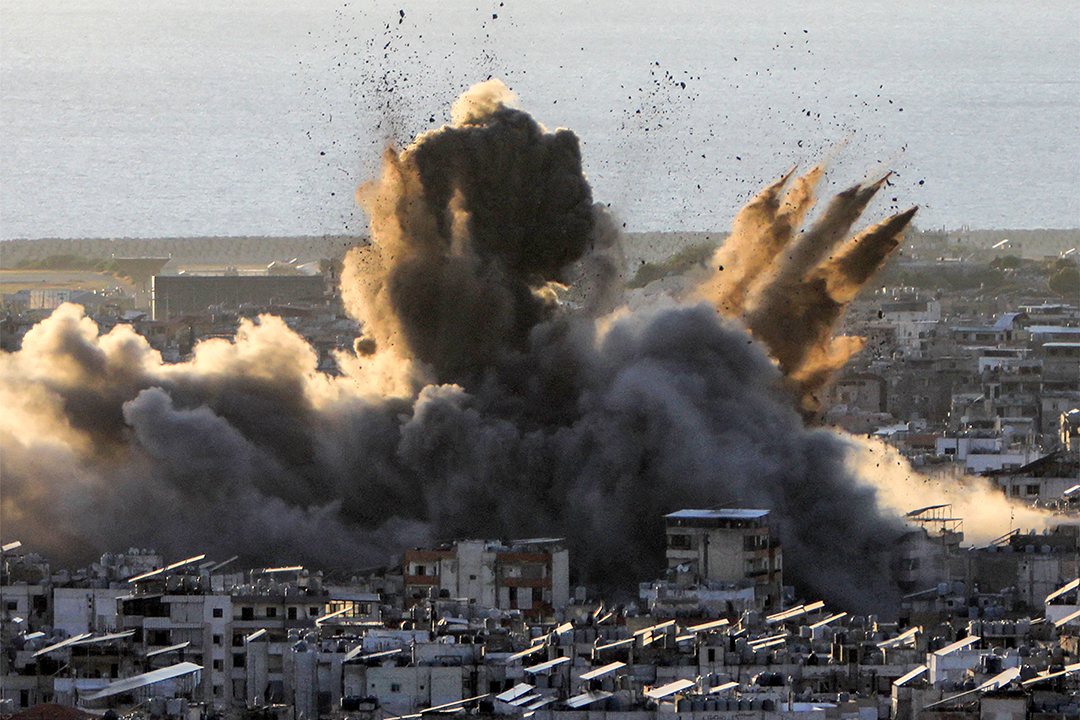 A cloud of smoke erupts following an Israeli airstrike on the southern suburbs of Beirut, Lebanon, on October 19, 2024.