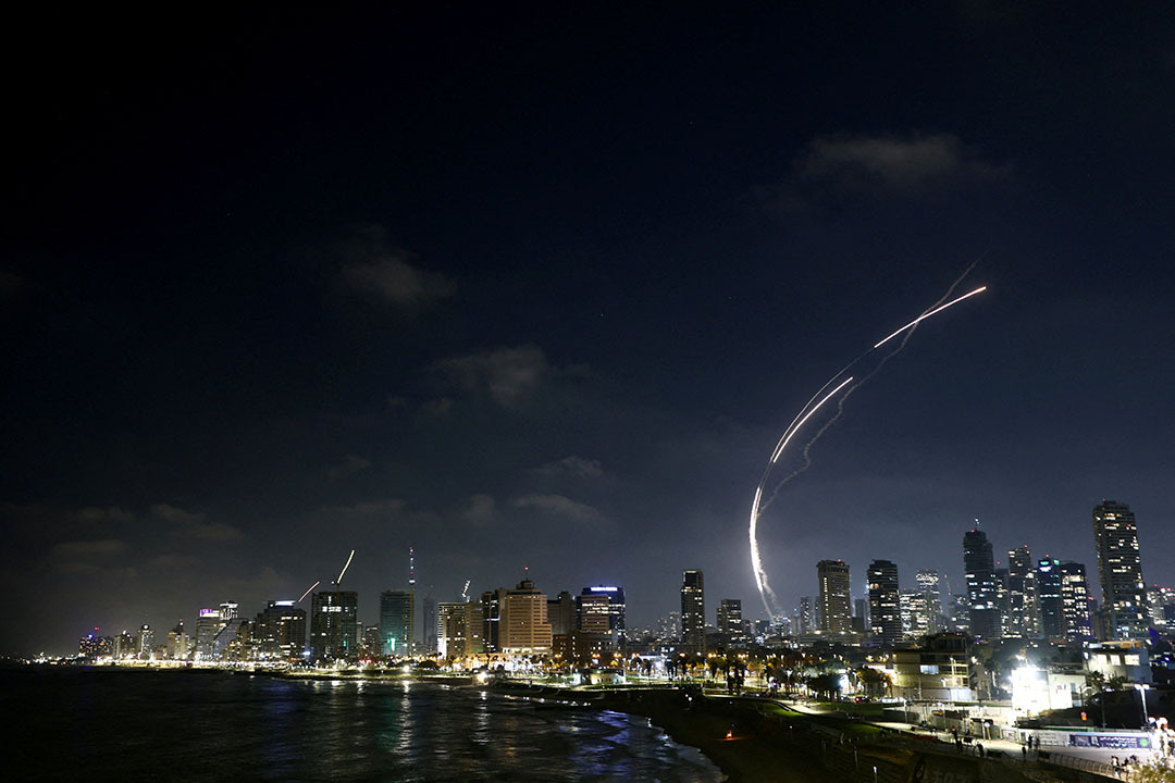 Israel intercepts Iranian missiles, as seen from Tel Aviv, June 13, 2025.