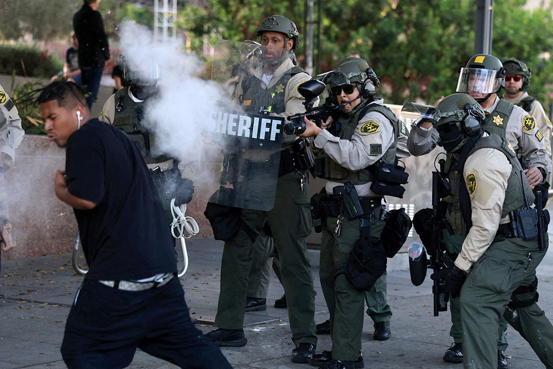 A law enforcement officer shoots non-lethal weapon at a protestor during a protest against federal immigration sweeps, in Los Angeles, California, U.S., June 11, 2025.